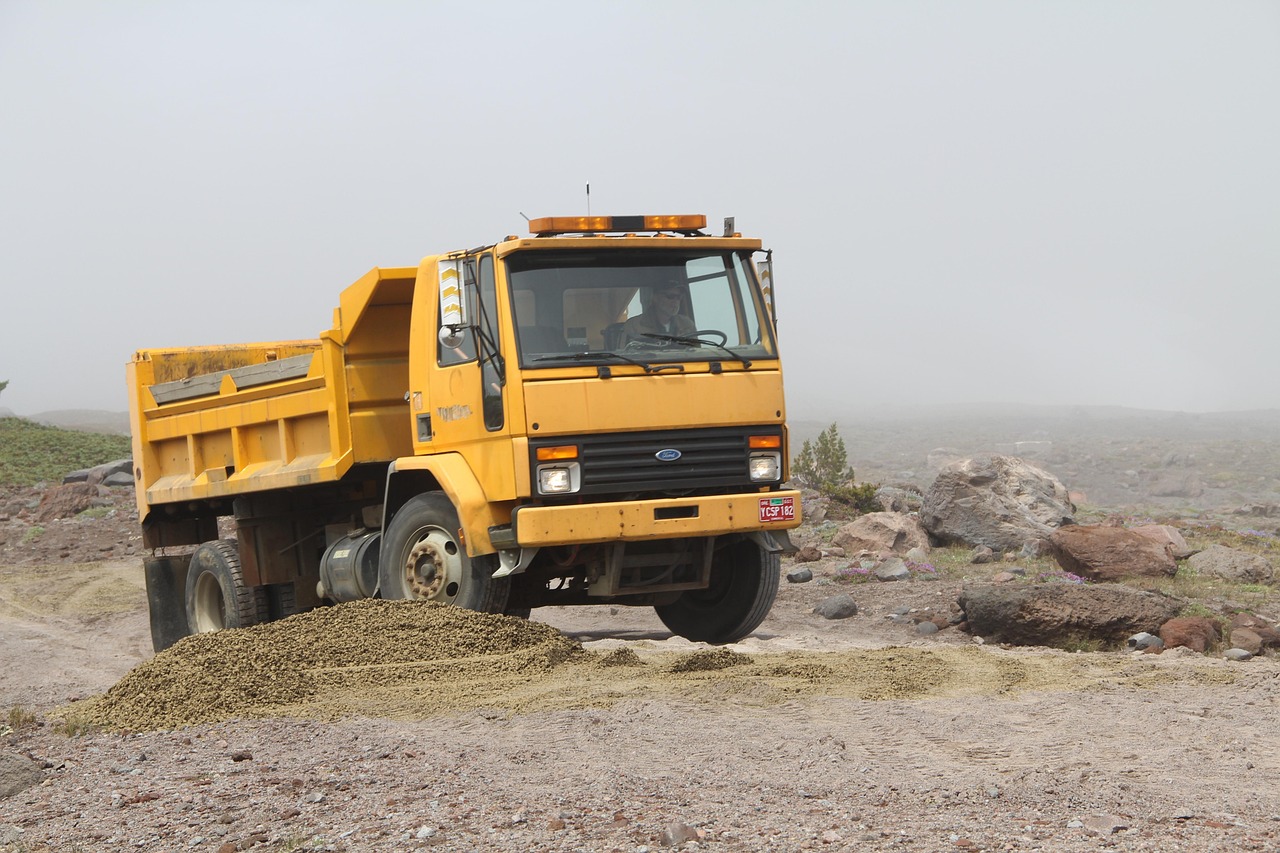 Construction site with multiple dumper trucks